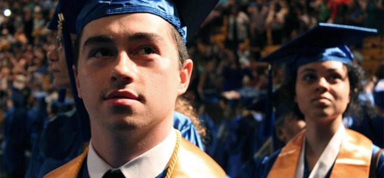 TCC graduates at commencement in cap and gown